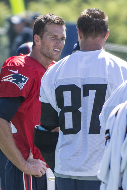 Tom Brady talking to Rob Grownkoski at Patriots training camp 2015.