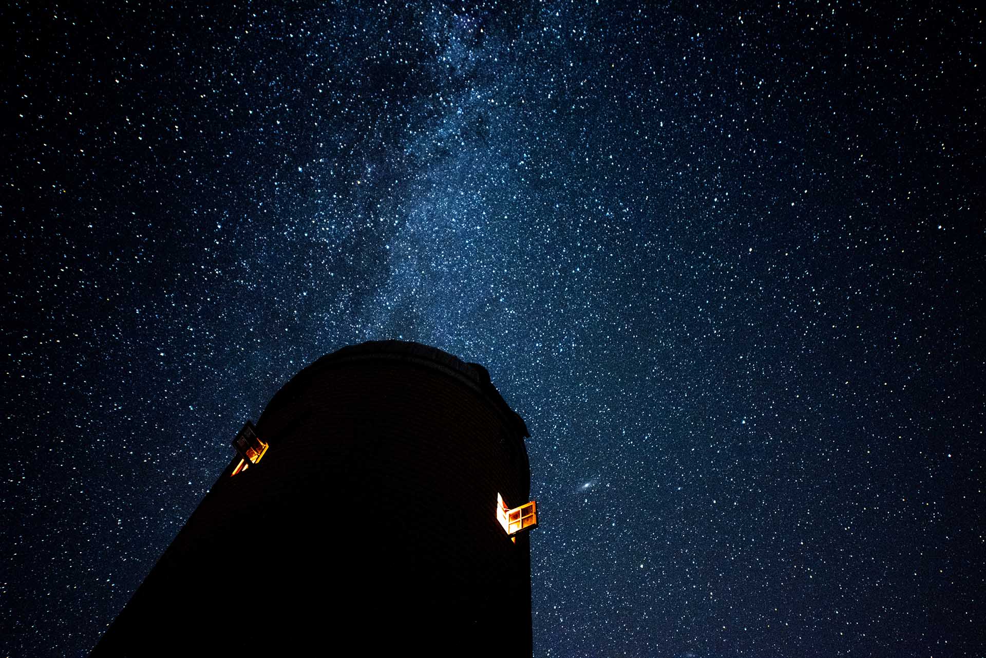 The observatory at the Roger Williams Estate at night with the Milky Way.