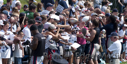 New England Patriots signing autographs in Training Camp versus the New Orleans Saints 2010.