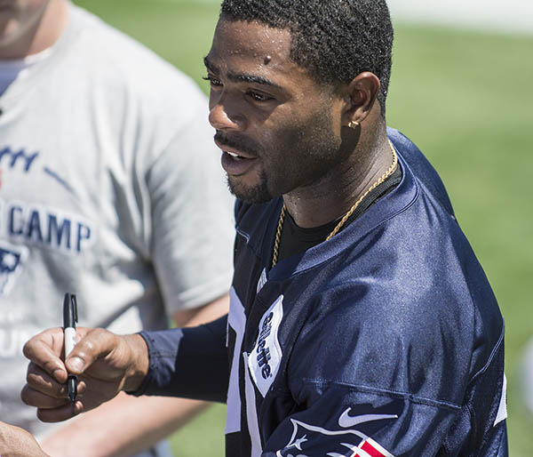 Malcolm Butler, the hero of Super Bowl XLIX, signing autographs at Patriots training camp 2015.